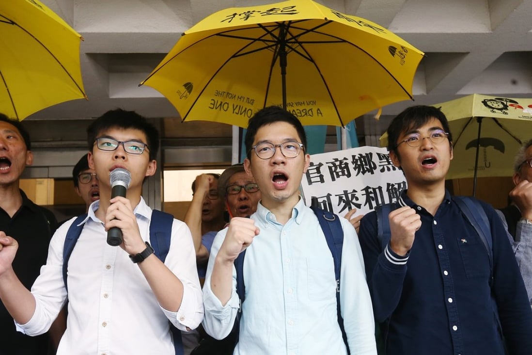 Activists (from left) Joshua Wong, Nathan Law and Alex Chow outside court on Wednesday. Photo: Dickson Lee
