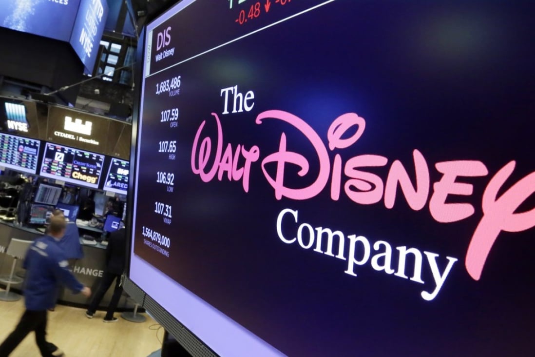 The Walt Disney Company logo appears on a screen above the floor of the New York Stock Exchange earlier this week. Photo: AP