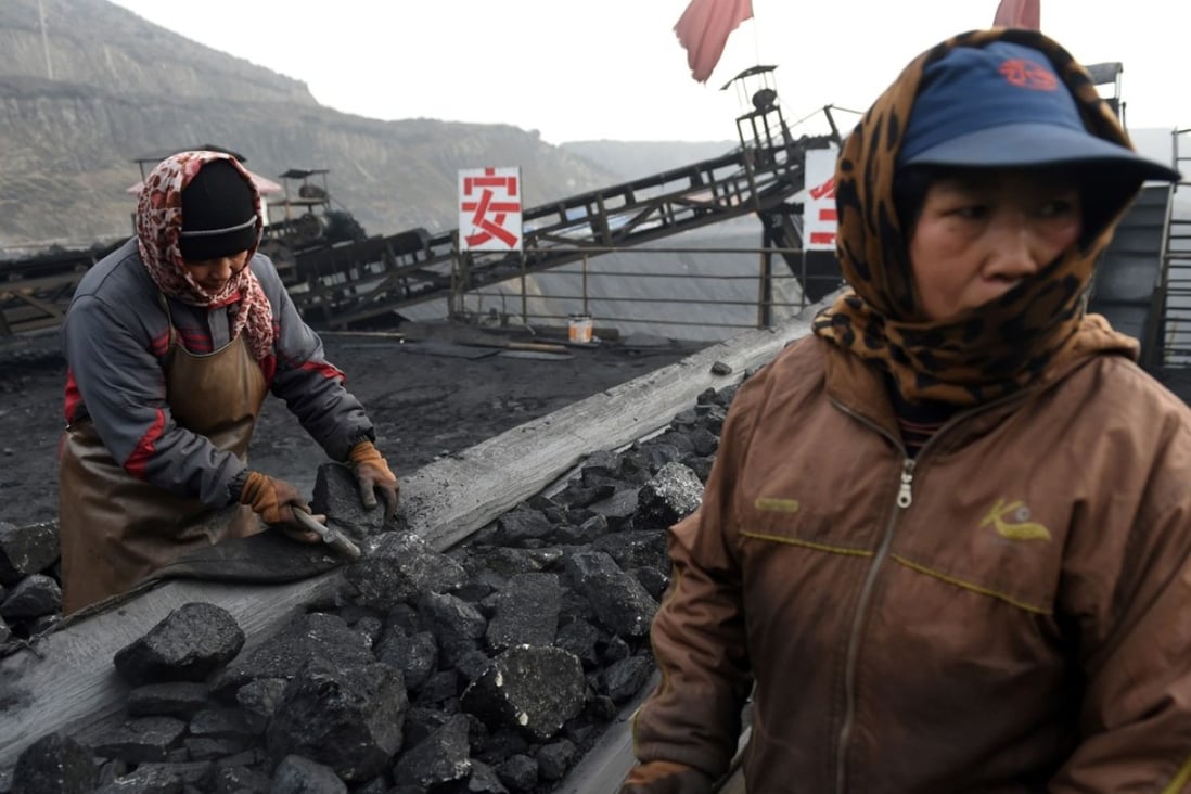 A file picture of workers sorting coal at a mine in Datong in Shanxi province. Photo: AFP