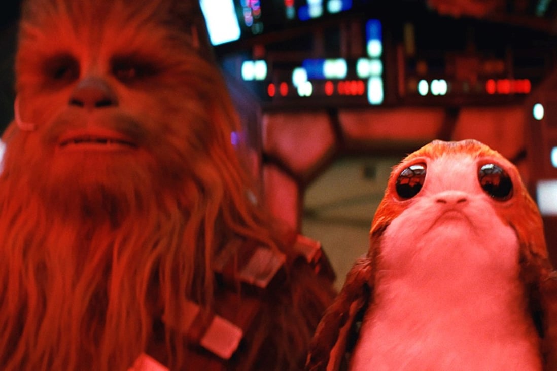 Chewbacca (Joonas Suotamo) and a Porg in a still from Star Wars: The Last Jedi first released by Entertainment Weekly. Photo: ILM/2017 Lucasfilm Ltd
