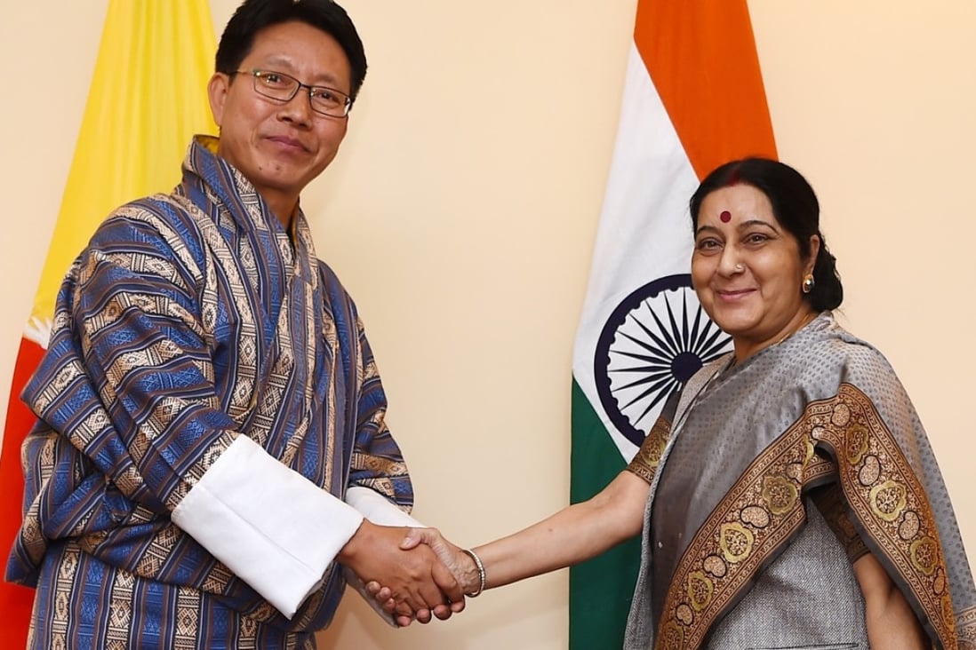 Bhutanese foreign minister Damcho Dorji and Indian foreign minister Sushma Swaraj (right) held a bilateral meeting on August 11 in Kathmandu, Nepal. Both India and China are important to Bhutan, but neither is an overlord of Bhutan. Photo: AFP