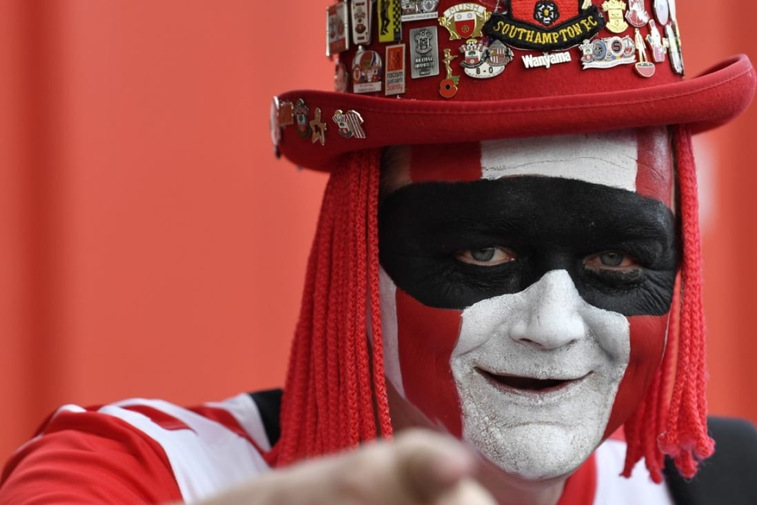 A Southampton fan in the club’s colours during its match against Manchester City at St Mary's Stadium on April 15 . Photo: Reuters