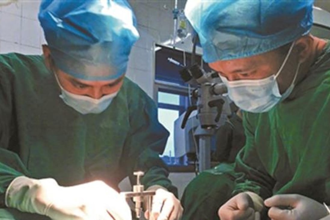 Doctors carrying out the surgery. Photo: Handout