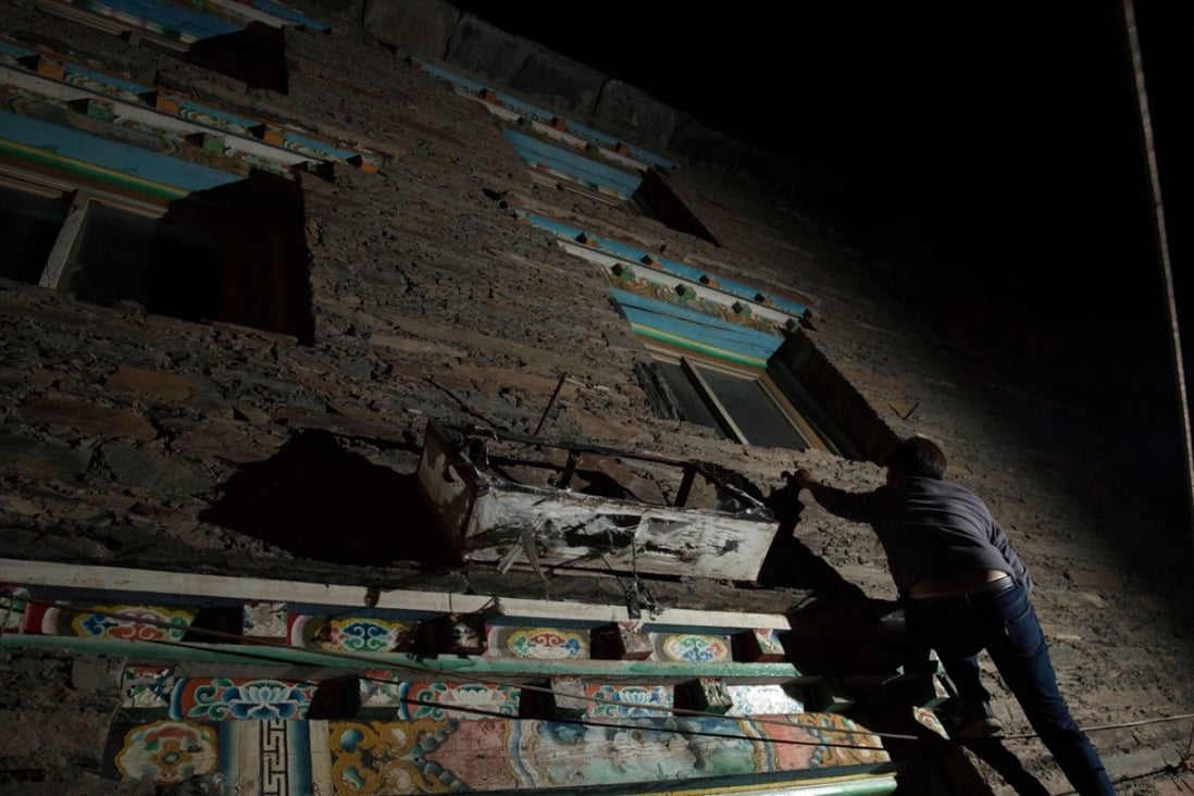 Trinley Norbu deploys his climbing skills ahead of a nocturnal tryst. Photo: AFP