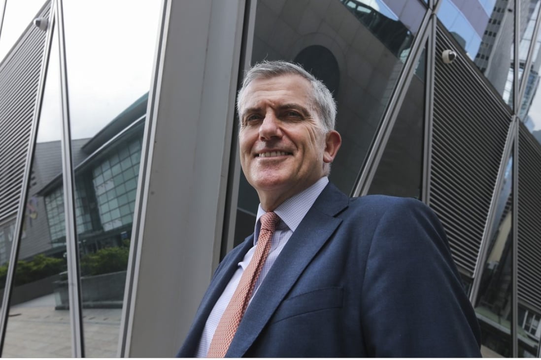 Savills Investment Management global chief executive officer Justin O'Connor outside the International Finance Centre in Central, Hong Kong. Photo: Dickson Lee
