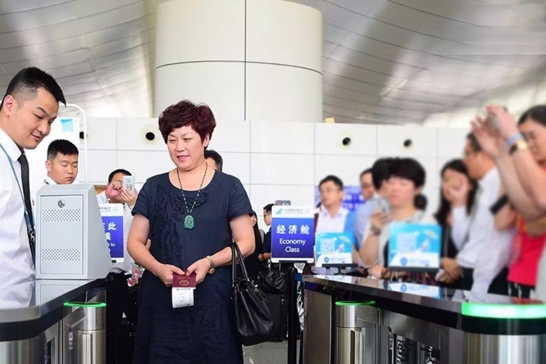 Passengers boarding at the Jiangying Airport in Nanyang by having their faces scanned in lieu of using boarding passes. The airport supported by BaiduÕs technologies is ChinaÕs first to allow passengers to board with the support of facial recognition. Photo: Handout