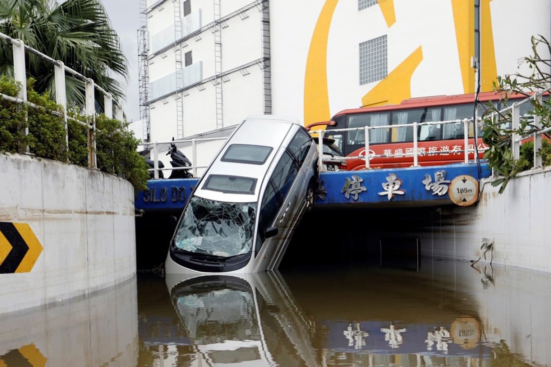A car lies damaged by Typhoon Hato in Macau. Photo: Reuters