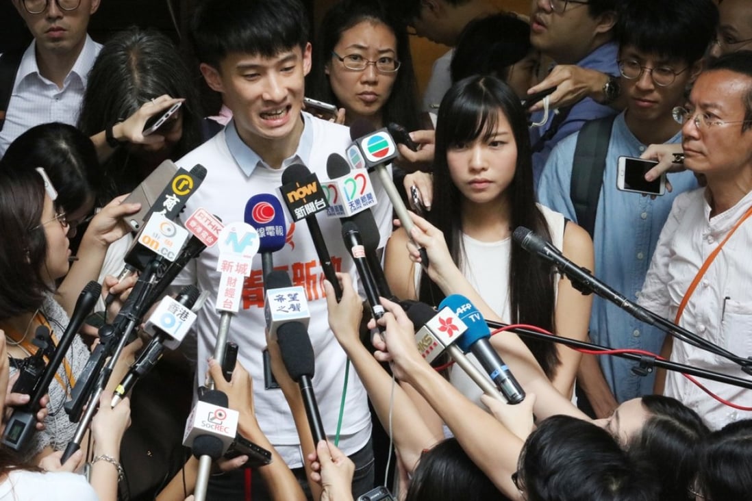 Disqualified lawmakers Sixtus Baggio Leung Chung-hang and Yau Wai-ching (centre) address media at the Court of Final Appeal. Photo: Felix Wong
