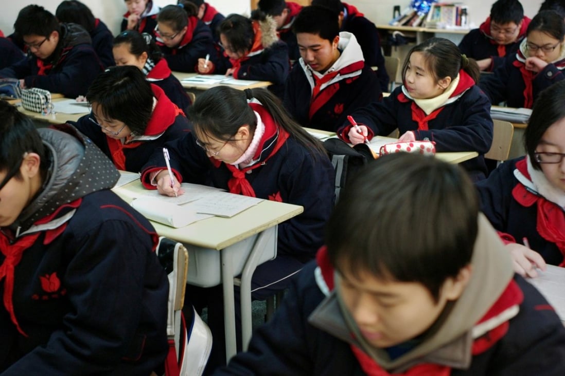 Children hard at work at the Jingan Education College Affiliated School in Shanghai, in January 2011. Teenagers from the school were among 500 Shanghai students who outperformed the rest of the world in reading, science and mathematics, in a study released the previous month. Photo: AFP