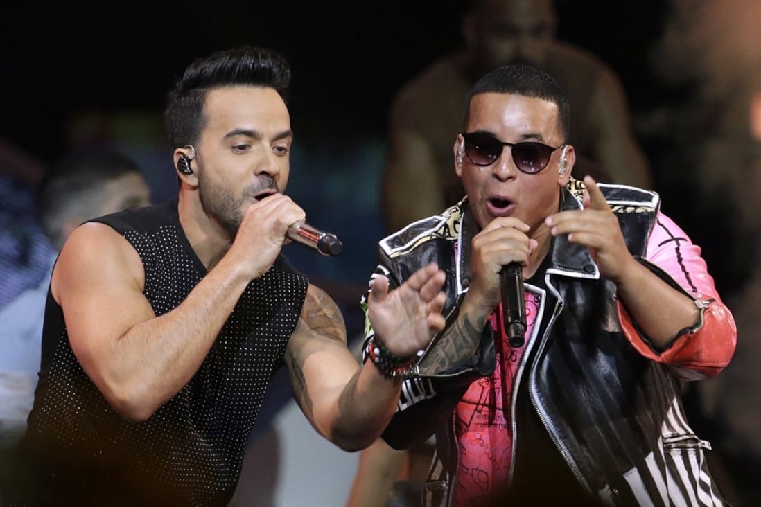 Singers Luis Fonsi, left, and Daddy Yankee during the Latin Billboard Awards in Florida. In a landmark moment for Latin music in the US, their hit “Despacito” spent its 16th week on top of the charts in the United States. Photo: AP