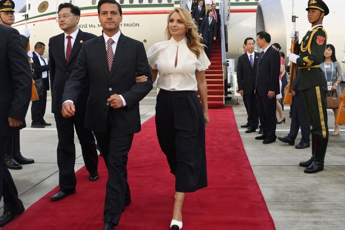 Mexican President Enrique Pena Nieto arrives in Xiamen, Fujian, on Monday with his wife. The president will attend the Dialogue of Emerging Markets and Developing Countries on the sidelines of the BRICS summit. Photo: Xinhua