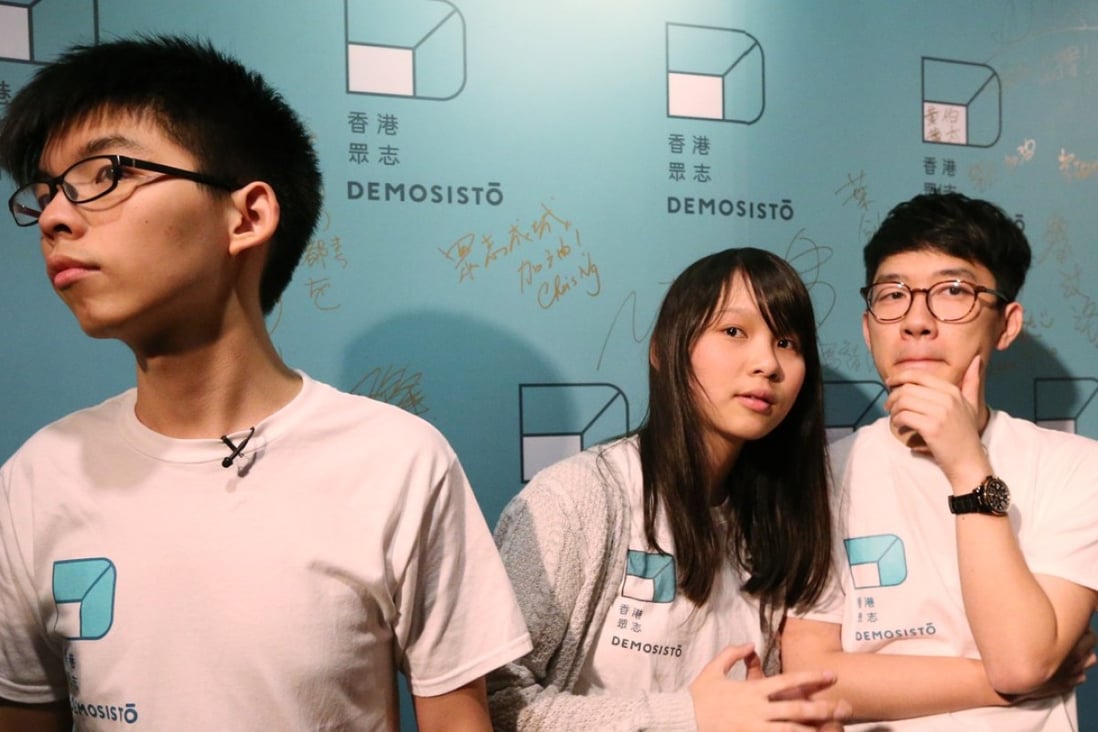 Joshua Wong (left) and Nathan Law (right), pictured with Agnes Chow Ting. All three are key figures in Demosisto. Photo: Felix Wong