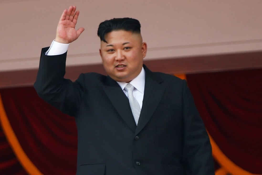 North Korean leader Kim Jong-un waves to people attending a military parade marking the 105th birthday of the country’s founding father, Kim Il-sung, in Pyongyang on April 15. Photo: Reuters