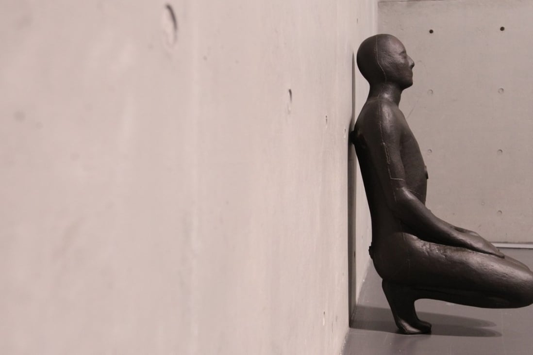 One of Antony Gormley’s Critical Mass sculptures squats against a wall at the Long Museum in Shanghai. Photo: Simon Song