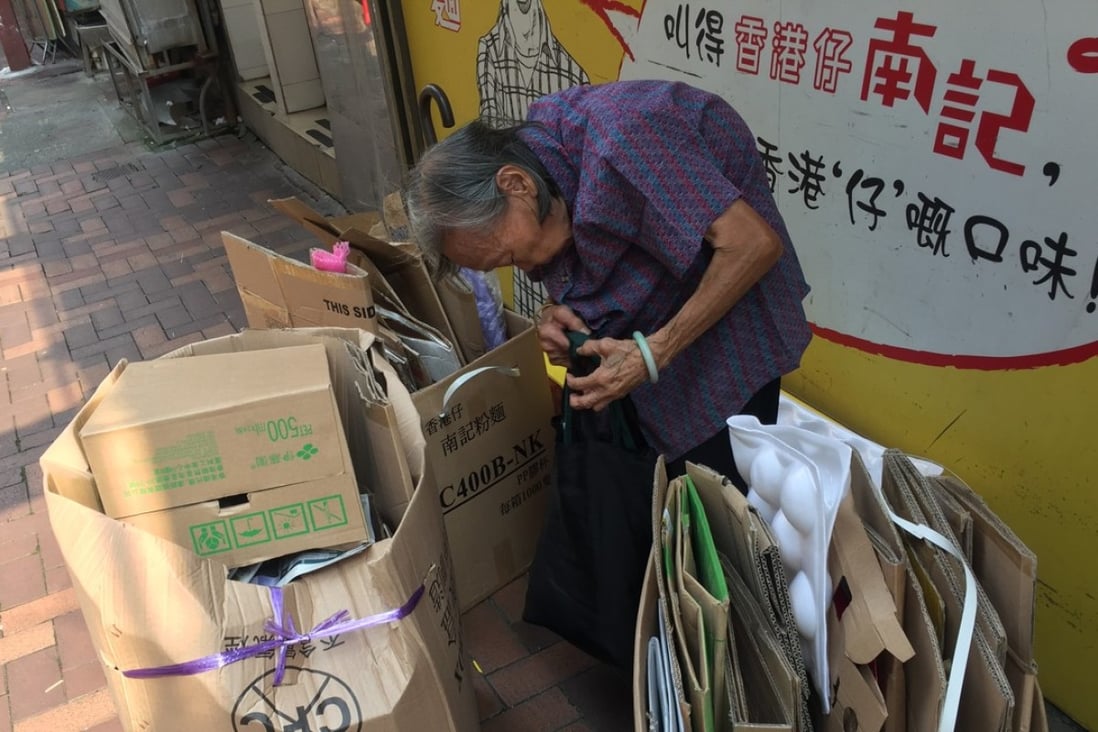 An 89-year-old woman collects used cardboard in Causeway Bay. Photo: Denise Tsang
