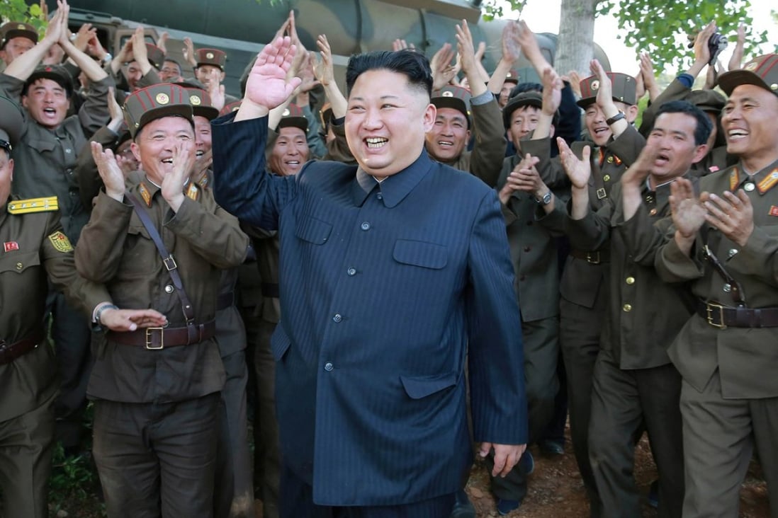 This undated photograph shows North Korean leader Kim Jong-un visiting an army unit. Photo: Handout