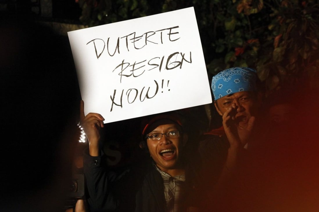 Human rights protesters call for the resignation of Philippine President Rodrigo Duterte. Photo: EPA