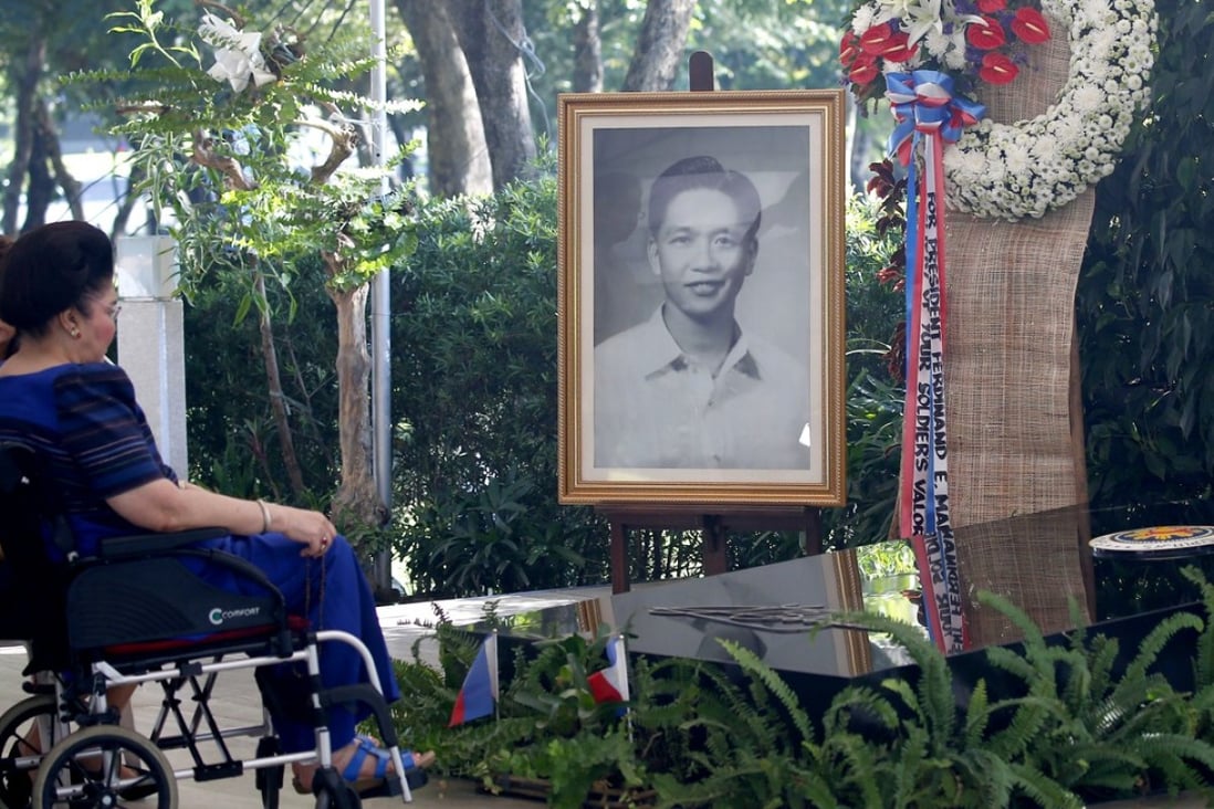 Imelda Marcos and Imee Marcos at the grave site of her husband, former dictator Ferdinand Marcos at the Heroes Cemetery. Photo: AP
