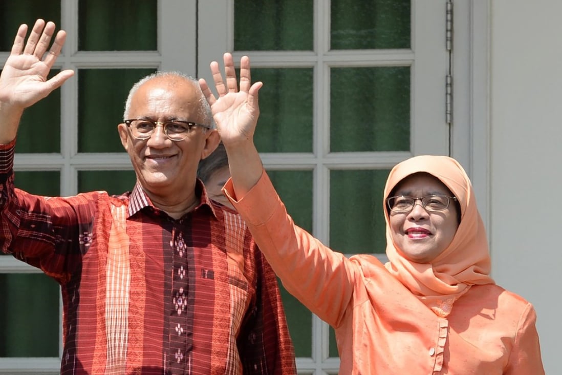 Singapore’s new president, Halimah Yacob, with husband Mohammed Abdullah Alhabshee. Photo: AFP