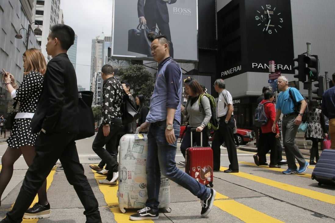The growth of mainland Chinese shopping for insurance products in the city has boosted the business of Hong Kong’s insurance industry. Photo: AP
