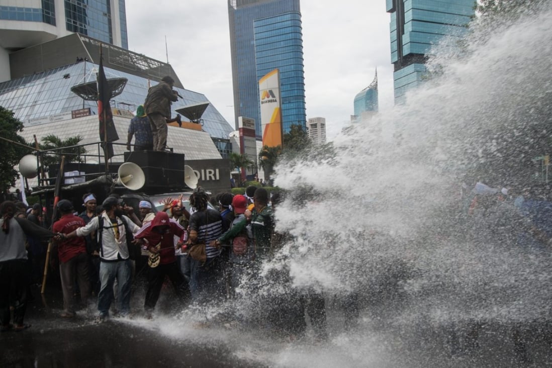 In December last year, West Papuan demonstrators calling for the region’s independence were disbursed with water cannons in the Indonesian capital of Jakarta. This week, a petition with 1.8 million signatures, requesting West Papua be put back on a UN decolonisation list, was not accepted by the international body. Photo: Xinhua