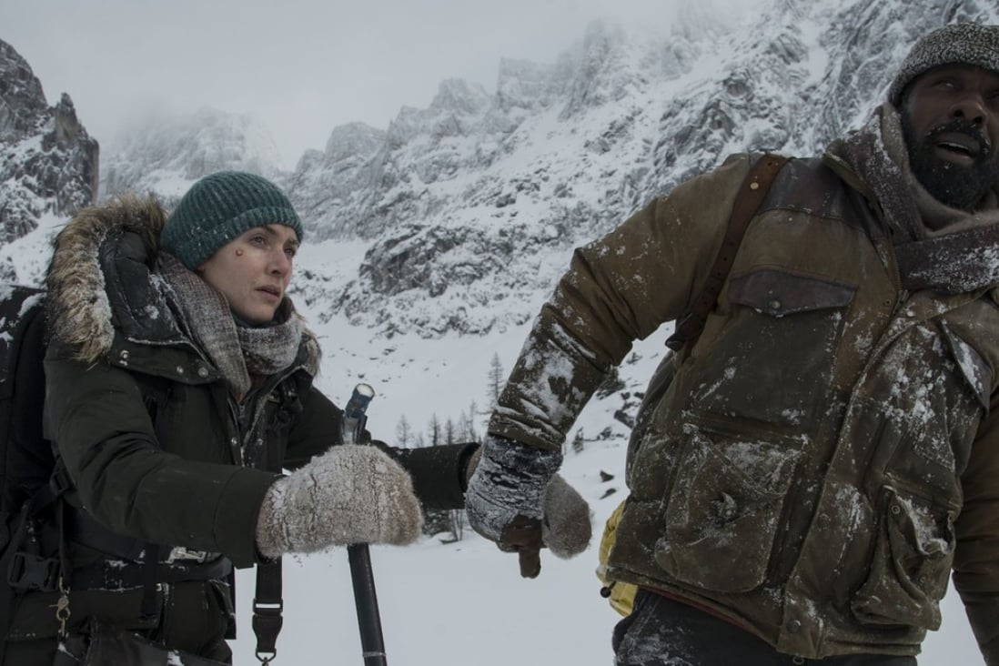 Kate Winslet and Idris Elba in a still from The Mountain Between Us (category IIB), directed by Hany Abu-Assad.