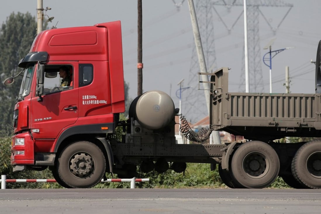 A liquefied natural gas truck drives along a road in Yutian county, China’s Hebei province. Sales of large LNG trucks are expected to hit record levels in China this year as the government steps up its anti-pollution campaign. Photo: Reuters