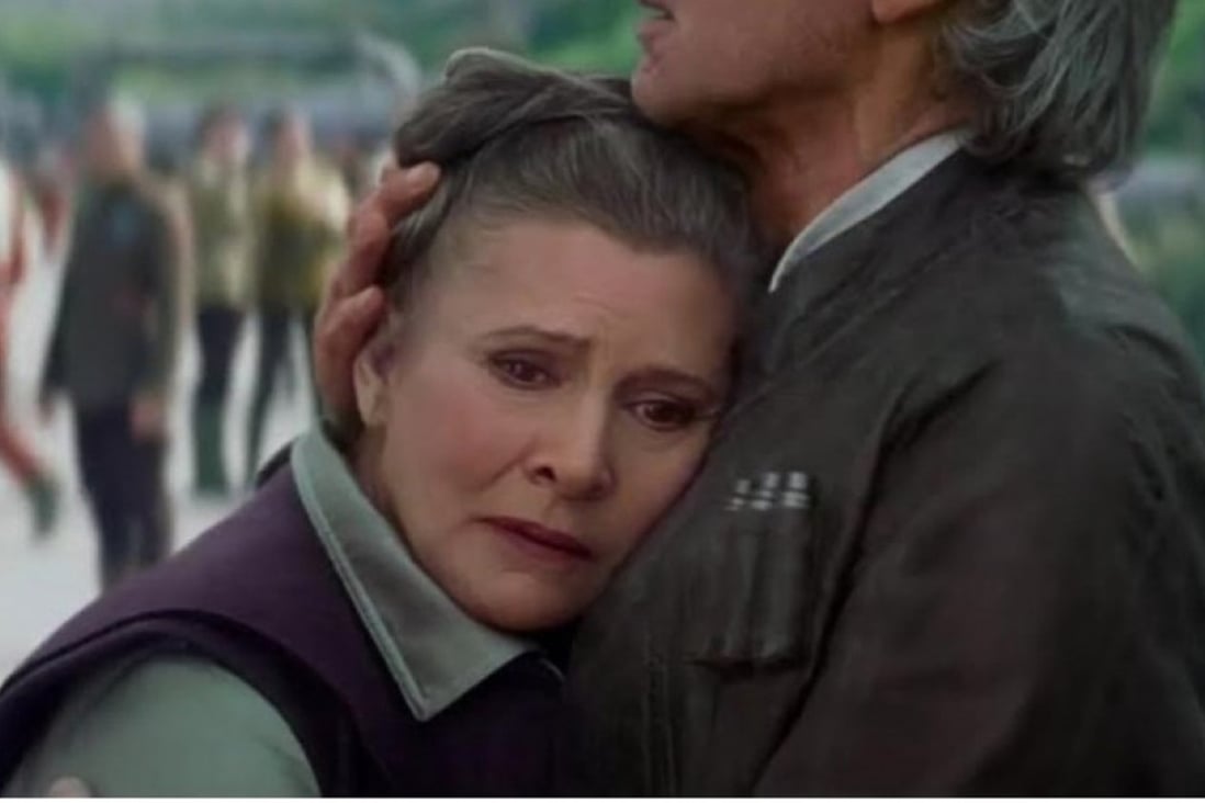Leia Organa (Carrie Fisher) hugs Han Solo (Harrison Ford) in The Force Awakens. Photo: Disney/Lucasfilm