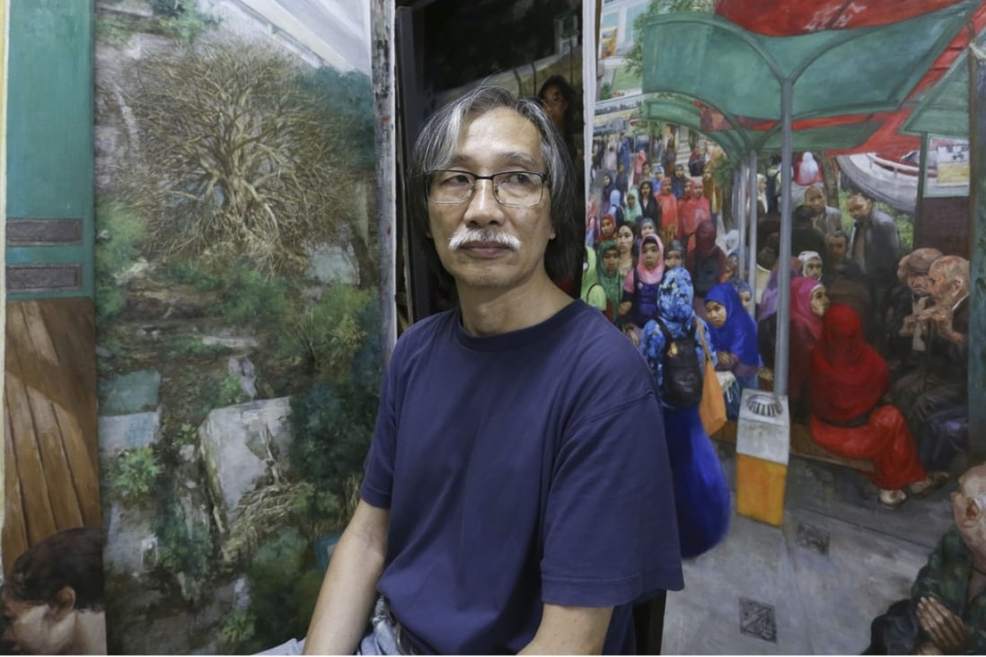 Yeung Tong-lung takes a break from work at his Kennedy Town studio. Photo: Jonathan Wong