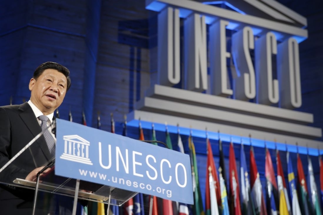 President Xi Jinping delivers a speech at the Unesco headquarters in Paris in 2014. His wife, Peng Liyuan, is a special envoy for Unesco’s campaign for girls’ and women’s education. Photo: AFP