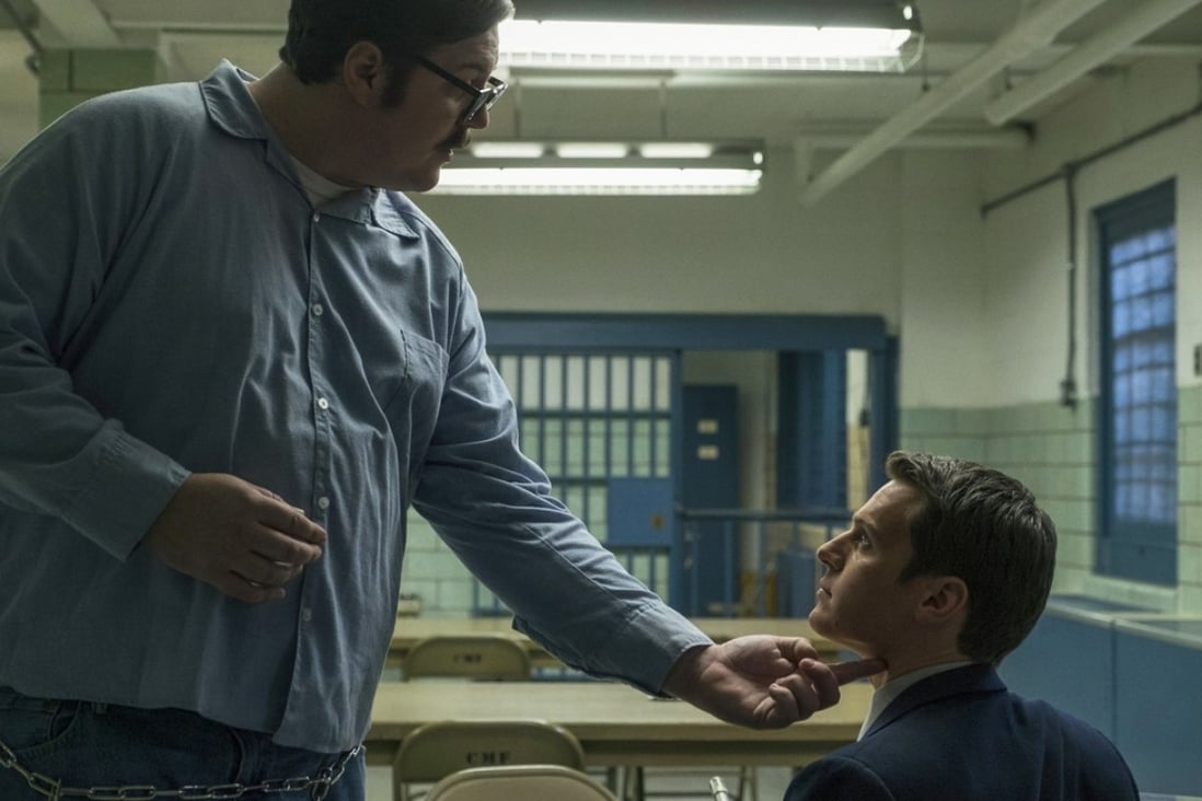 Jonathan Groff (right) stars as an FBI agent trying to understand serial killers like Cameron Britton (left) in the new 10-episode series Mindhunter to be launched on Netflix today. Photo: AP