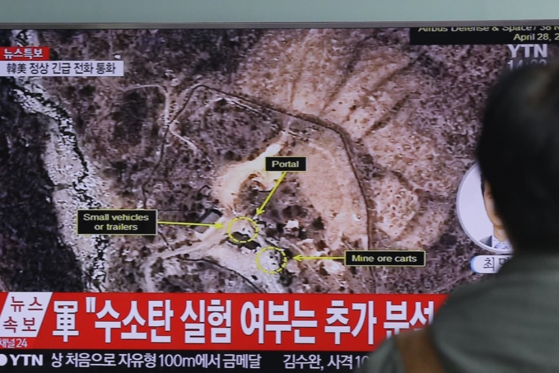 A man in Seoul watches a news report about a 2016 North Korean nuclear test under Mount Mantap. File photo: AP