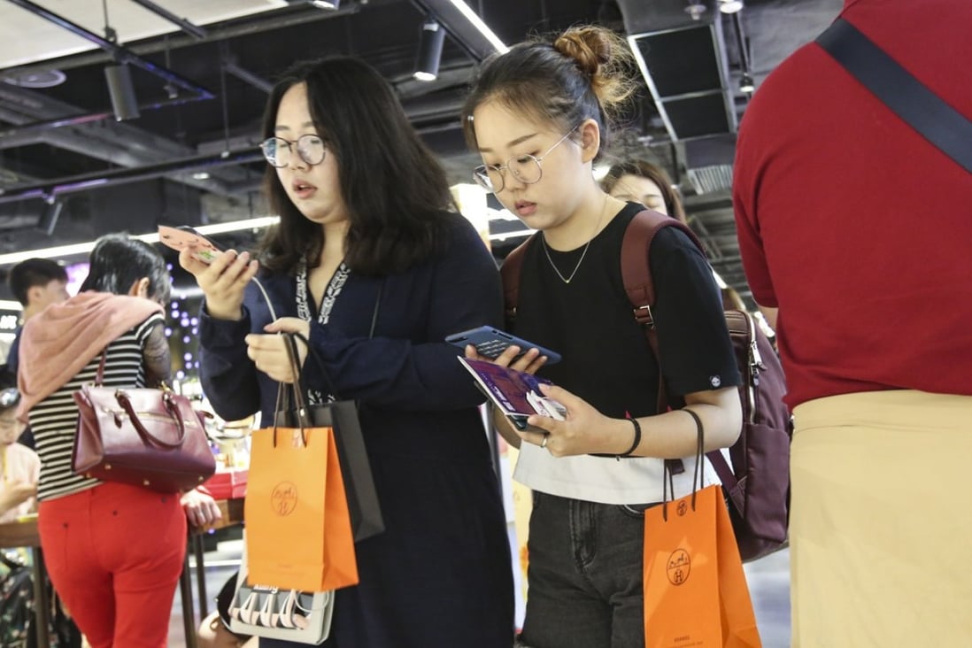 China’s online consumer credit providers have benefited from the country’s spending boom and lending to consumers who cannot obtain credit from traditional financial institutions. Photo: Edward Wong