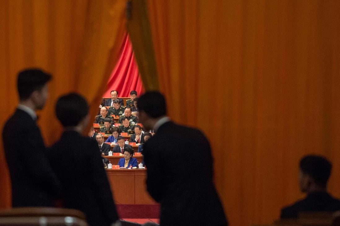 Security guards take a look at military delegates during President Xi Jinping’s speech at the 19th party congress in Bejing on October 18, in which he stressed the country’s many achievements and made clear that he believed China was on the precipice of becoming a “great” global power. Photo: AFP