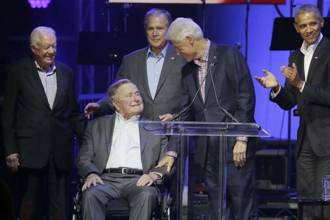 All five living former US presidents make rare appearance for hurricane