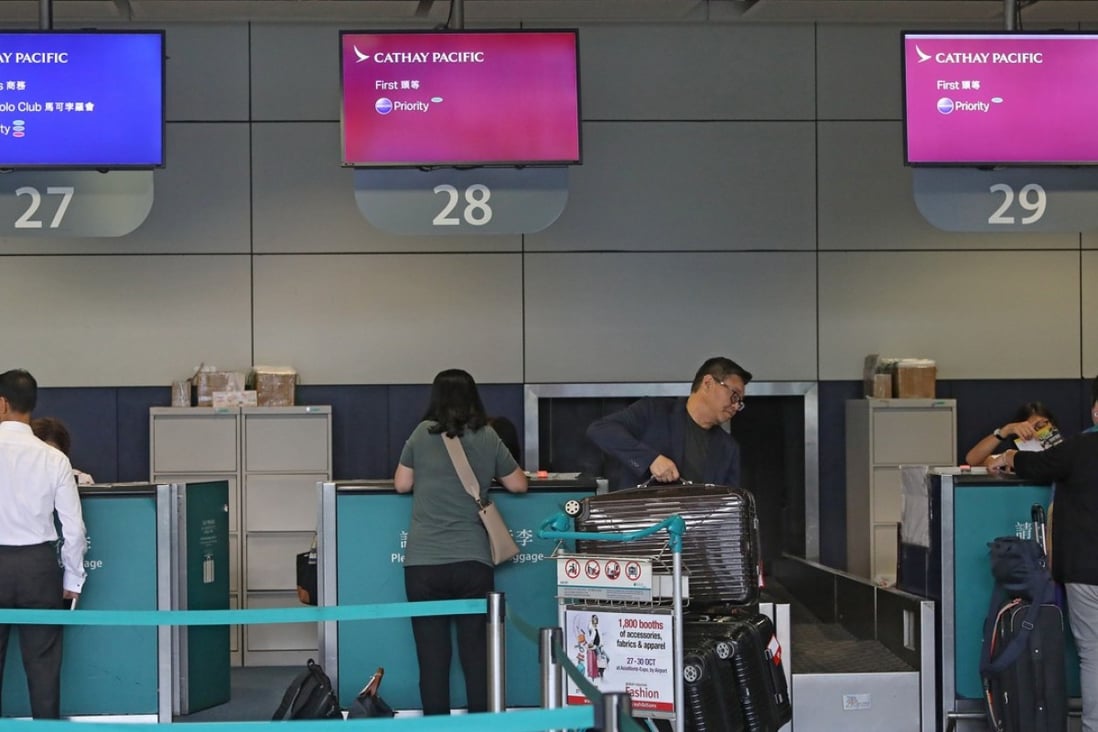 Cathay Pacific is stopping its downtown check-in service at Hong Kong and Kowloon stations for all US-bound travellers from Thursday. Photo: Sam Tsang