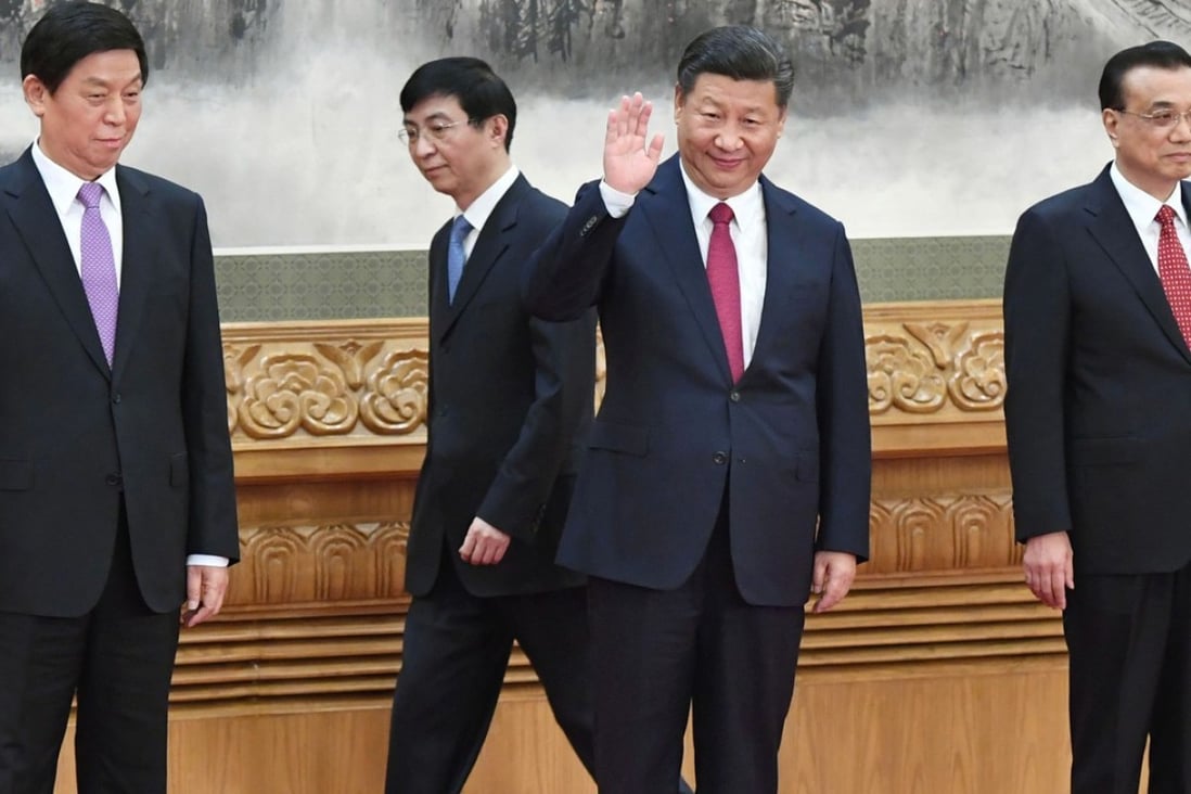 President Xi Jinping (second from right) with members of his new leadership team including Premier Li Keqiang (right), Li Zhanshu (left) and Wang Huning in Beijing on Wednesday. Photo: Kyodo