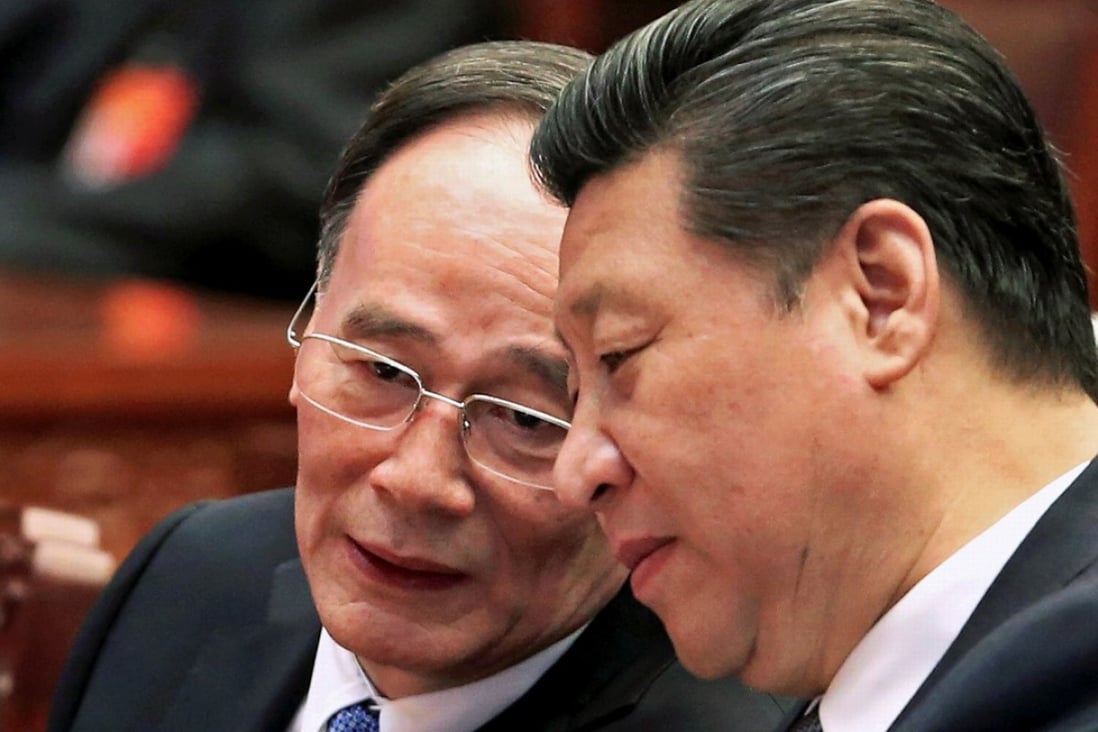 Wang Qishan (left) and President Xi Jinping at the annual meeting of the National People’s Congress in Beijing in March 2015. Photo: Reuters