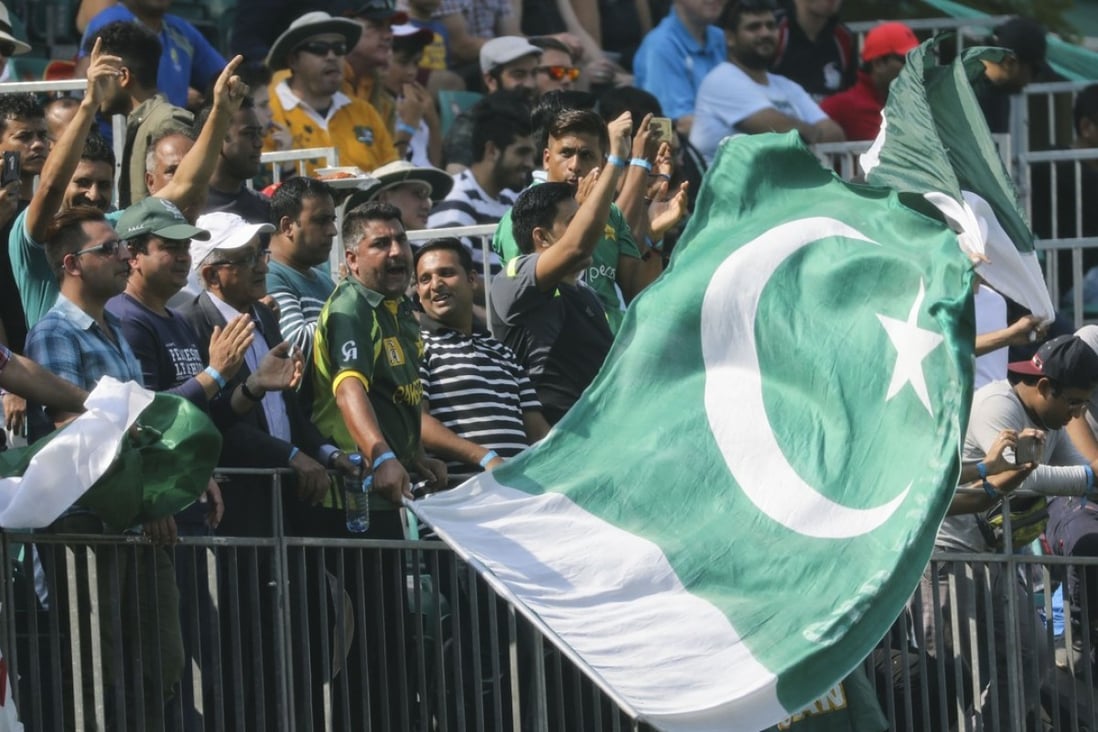 Pakistan fans cheer on their team during the first day of the Hong Kong World Sixes at Kowloon Cricket Club. Photo: Edward Wong