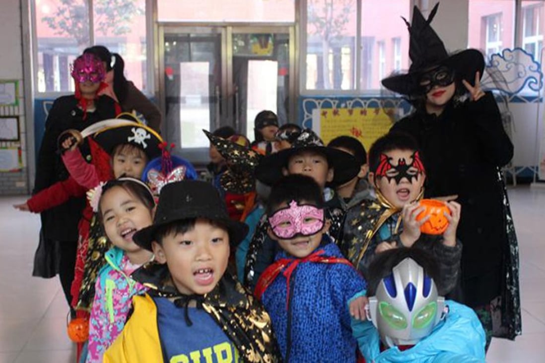 Children and their teachers celebrate Halloween at a kindergarten in Beijing. Photo: Handout