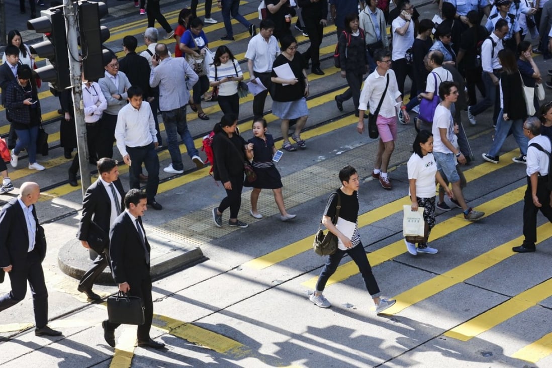 People walk in Hong Kong’s Central district, which gets middling ratings for “walkability”. Photo: Felix Wong