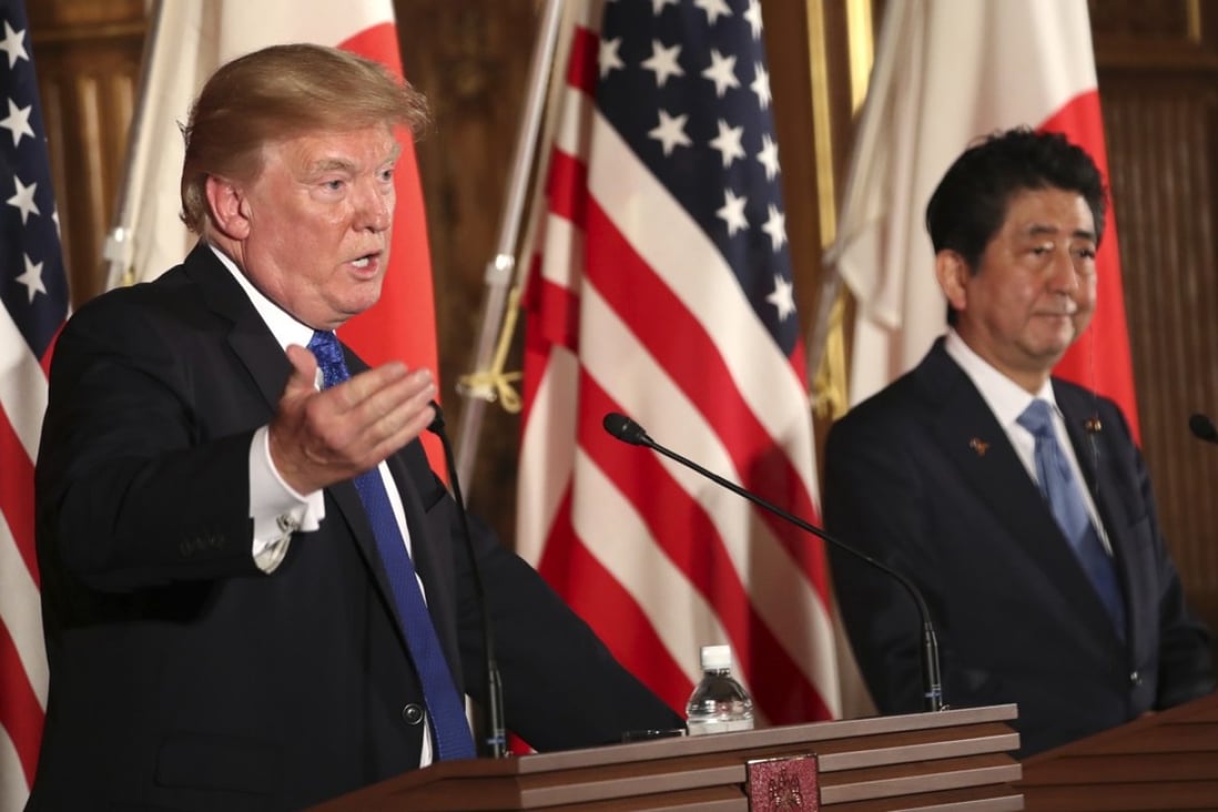 US President Donald Trump and Japanese Prime Minister Shinzo Abe hold a joint news conference in Tokyo. Photo: AP