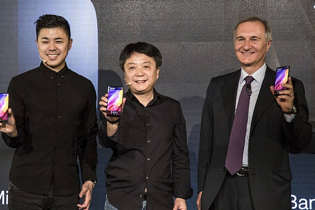 From left: Donovan Sung, director of product management and marketing for Xiaomi Global, Wang Xiang, senior vice president of Xiaomi, and Enrico Salvatori, senior vice president and president, Qualcomm EMEA, at the sales launch in Madrid. Photo: Handout
