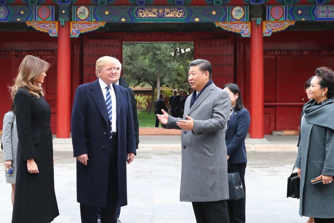 Chinese President Xi Jinping (second from right) and his wife Peng Liyuan (right) welcome US President Donald Trump and his wife Melania to the Forbidden City in Beijing on Wednesday. Photo: Xinhua