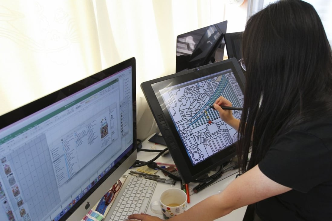 A designer gets down to work at the Design Incubation Centre in Kowloon Bay. Photo: Roy Issa