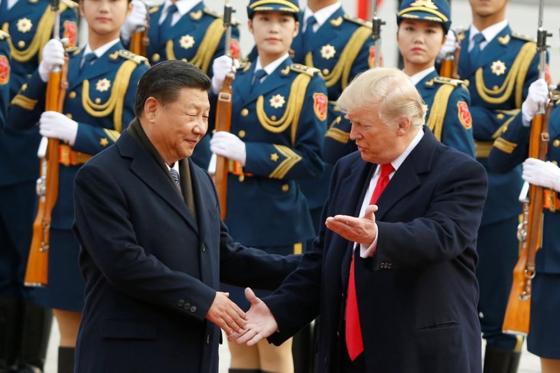 Chinese President Xi Jinping (left) and US President Donald Trump attend a welcome ceremony at the Great Hall of the People in Beijing. Photo: Reuters