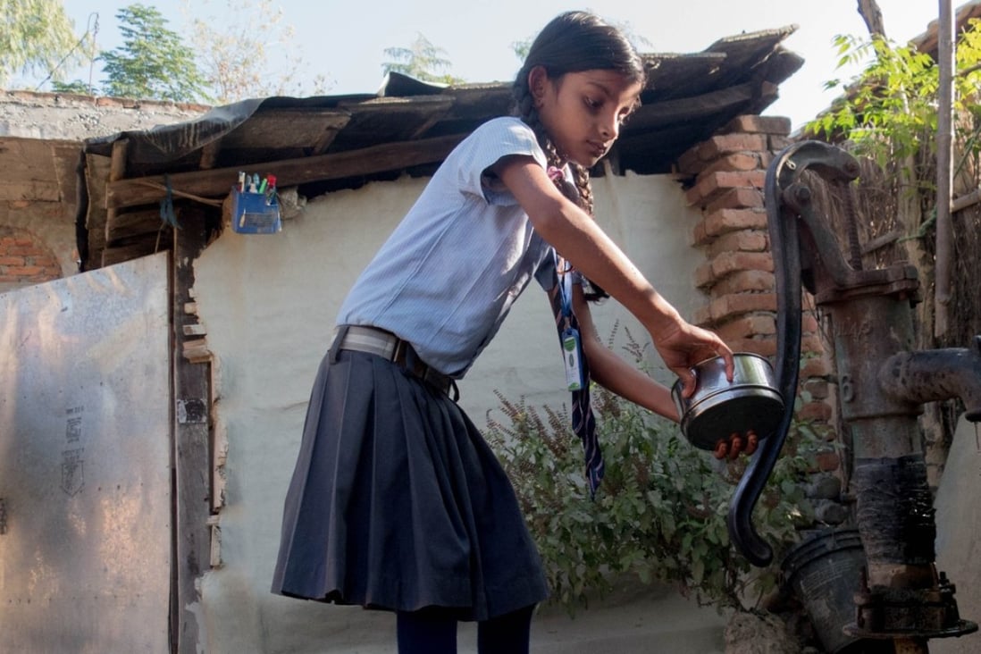 Arti, six, gets ready for school. Her mother, Babita Kumari Yadav, of Potohr village, was married as a young teen and received no education. She hopes that Arti will not marry until after she has finished her studies. Pictures: Abby Seiff