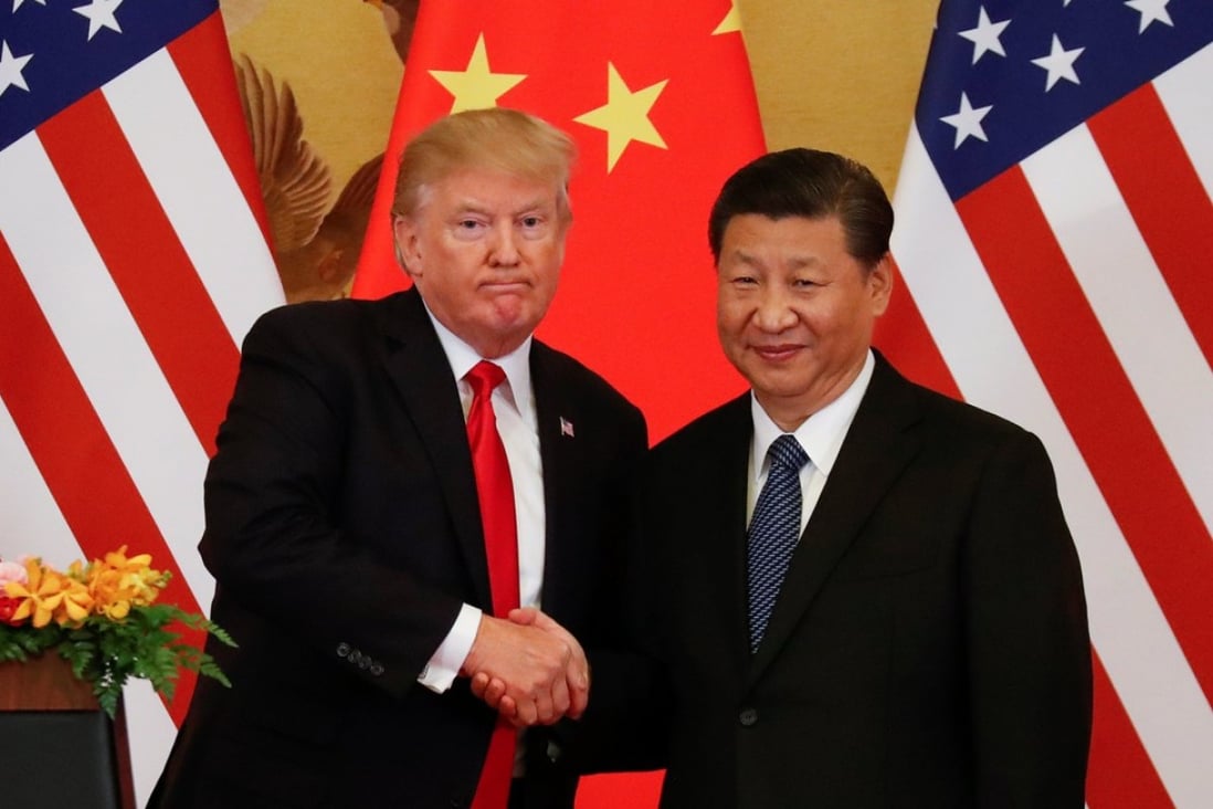 US President Donald Trump and Chinese President Xi Jinping shake hands after making joint statements at the Great Hall of the People in Beijing on Thursday. Photo: Reuters