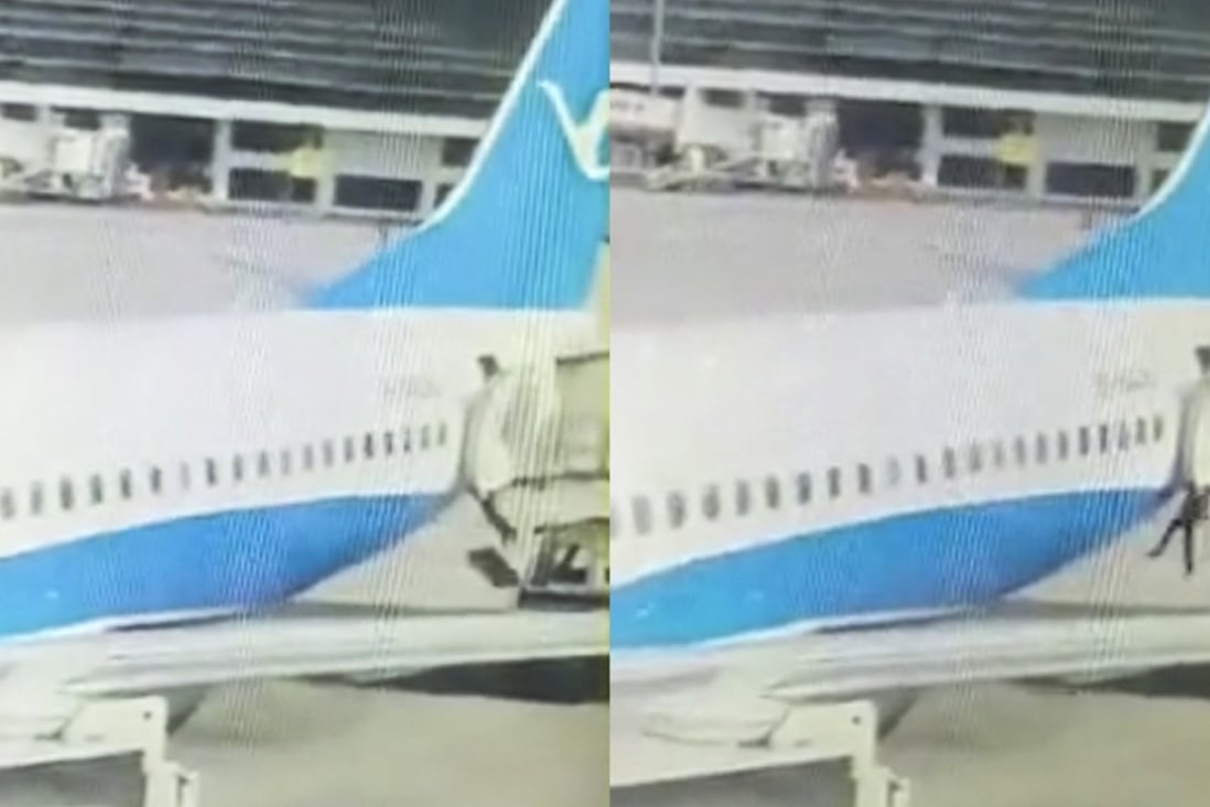 The Xiamen Air flight attendant can be seen plunging from the rear door of the Boeing 737 as it was being restocked at Zhengzhou airport. Photo: News.qq.com