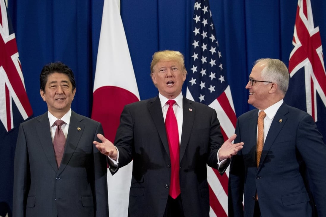 Japanese Prime Minister Shinzo Abe, US President Donald Trump and Australian Prime Minister Malcolm Turnbull meet during the Asean Summit in Manila on Monday. Abe first raised the idea of the Quad 10 years ago. Photo: AP